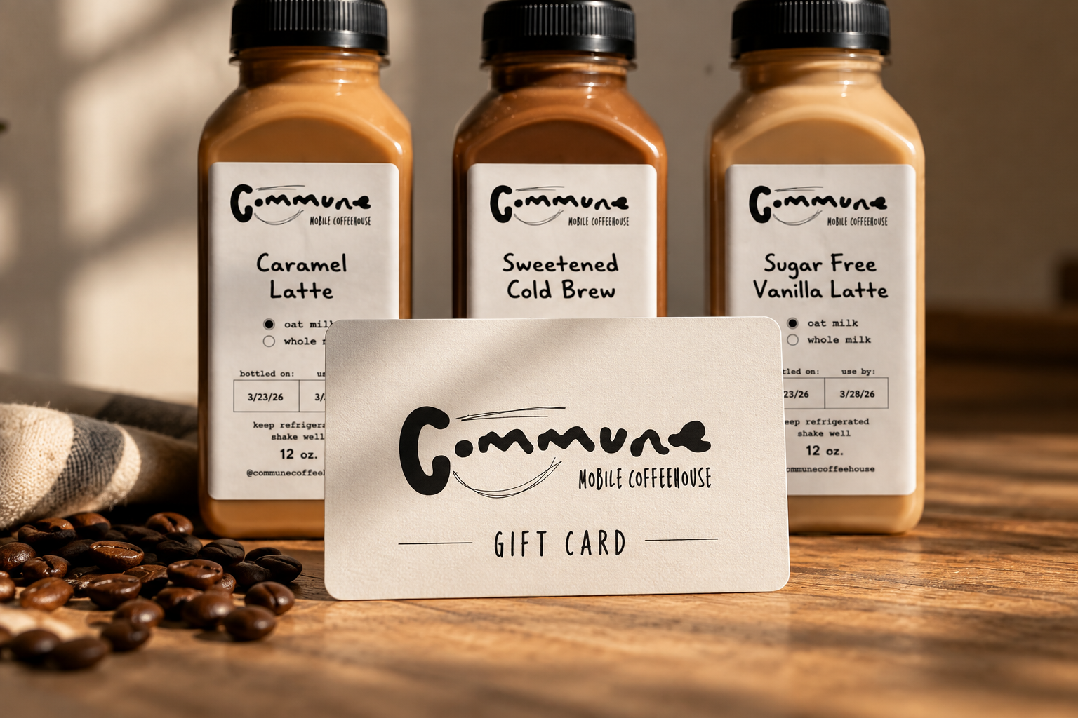 Commune Coffee gift card with three bottled coffees